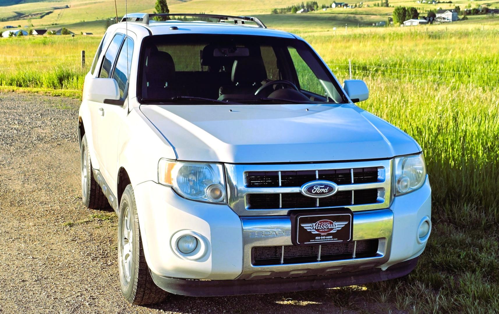 2011 White /Black Ford Escape Limited 4WD (1FMCU9EG3BK) with an 3.0L V6 DOHC 24V engine, 6A transmission, located at 450 N Russell, Missoula, MT, 59801, (406) 543-6600, 46.874496, -114.017433 - AWD SUV. Like New Bridgestone Tires. 3.0 V6 Engine. Automatic Transmission. AM FM CD Player. Bluetooth Phone Connectivity. Air Conditioning. Cruise Control. Power Heated Front Seats.. Power Windows and Locks. Clean Title and Carfax. We Finance through local Credit Unions. We do NOT offer In House- Photo#3