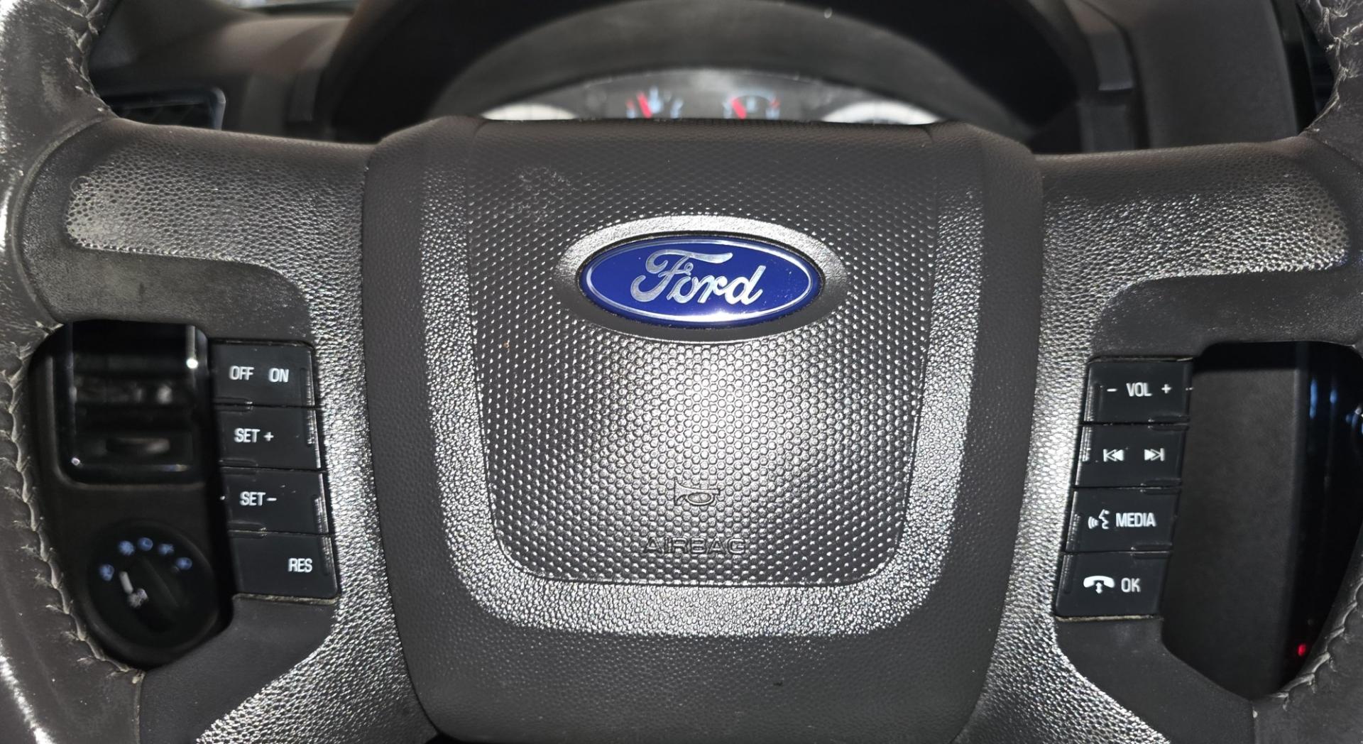 2011 White /Black Ford Escape Limited 4WD (1FMCU9EG3BK) with an 3.0L V6 DOHC 24V engine, 6A transmission, located at 450 N Russell, Missoula, MT, 59801, (406) 543-6600, 46.874496, -114.017433 - AWD SUV. Like New Bridgestone Tires. 3.0 V6 Engine. Automatic Transmission. AM FM CD Player. Bluetooth Phone Connectivity. Air Conditioning. Cruise Control. Power Heated Front Seats.. Power Windows and Locks. Clean Title and Carfax. We Finance through local Credit Unions. We do NOT offer In House- Photo#11