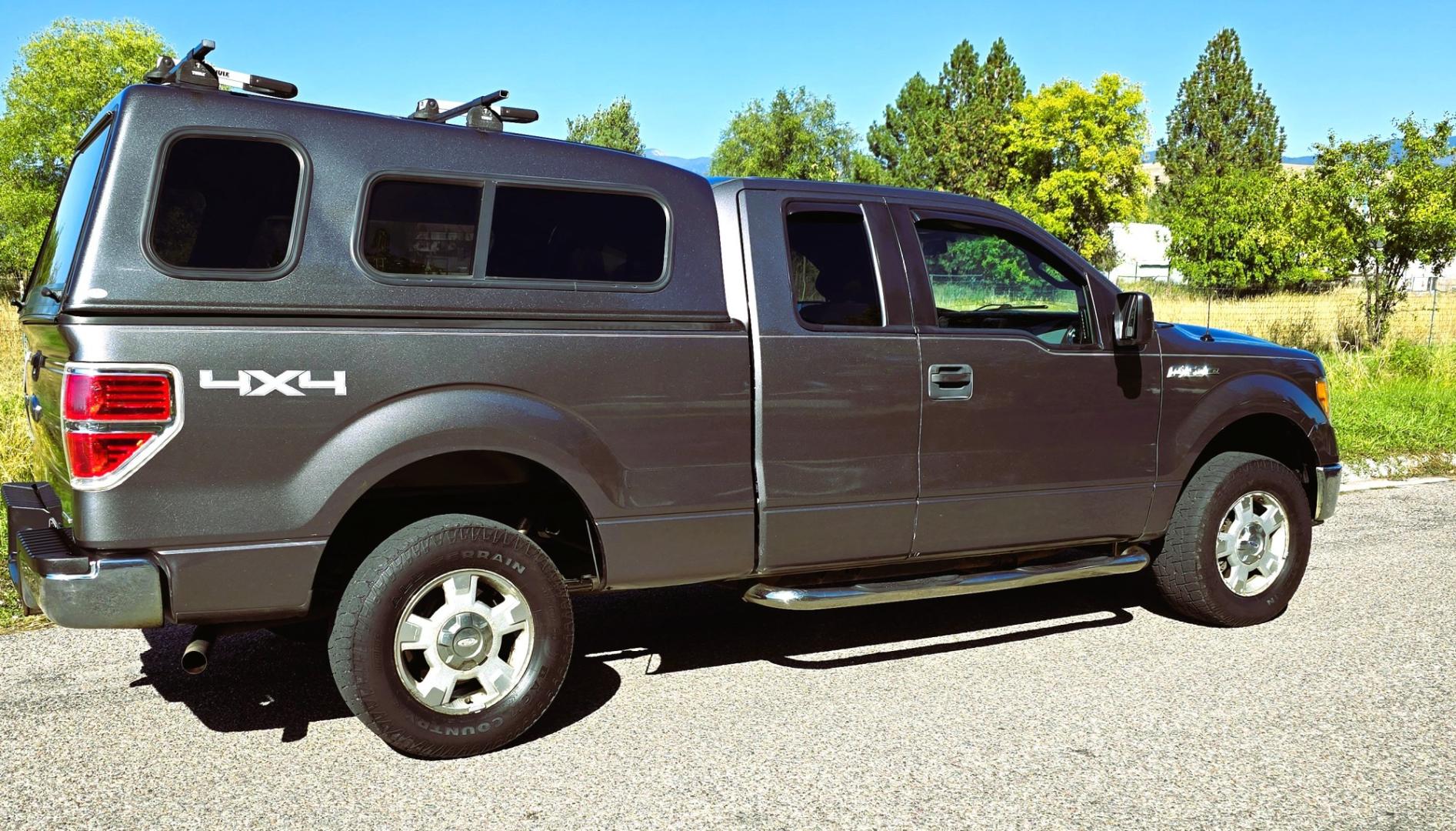 2012 Grey /Gray Ford F-150 XLT SuperCab 6.5-ft. Bed 4WD (1FTEX1EM3CF) with an 3.7L V6 DOHC 24V engine, 6-Speed Automatic transmission, located at 450 N Russell, Missoula, MT, 59801, (406) 543-6600, 46.874496, -114.017433 - 4WD Ford F-150 Pickup with Nice Matching Topper. 3.7L V6 Engine. 6 Speed Automatic Transmission. New Tires! Air Conditioning. AM FM CD Player with Bluetooth Phone Connectivity. Cruise Control. Seats 6. Rear Sliding Window. We Finance through local Credit Unions. We do NOT offer In House (Buy Her- Photo#1
