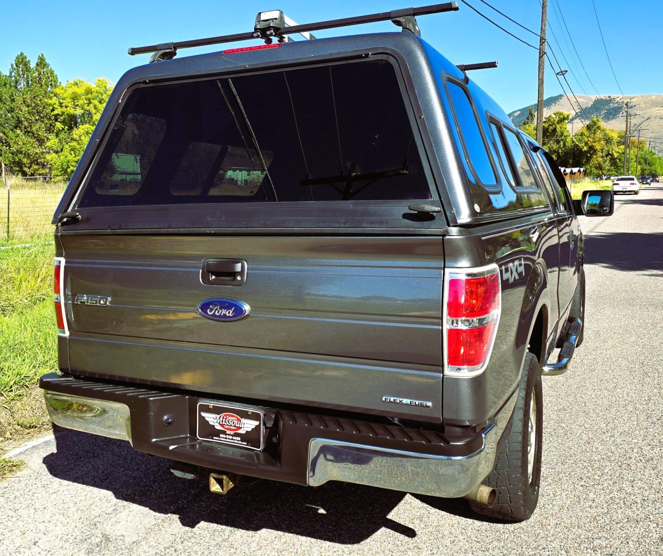 2012 Grey /Gray Ford F-150 XLT SuperCab 6.5-ft. Bed 4WD (1FTEX1EM3CF) with an 3.7L V6 DOHC 24V engine, 6-Speed Automatic transmission, located at 450 N Russell, Missoula, MT, 59801, (406) 543-6600, 46.874496, -114.017433 - 4WD Ford F-150 Pickup with Nice Matching Topper. 3.7L V6 Engine. 6 Speed Automatic Transmission. New Tires! Air Conditioning. AM FM CD Player with Bluetooth Phone Connectivity. Cruise Control. Seats 6. Rear Sliding Window. We Finance through local Credit Unions. We do NOT offer In House (Buy Her- Photo#3