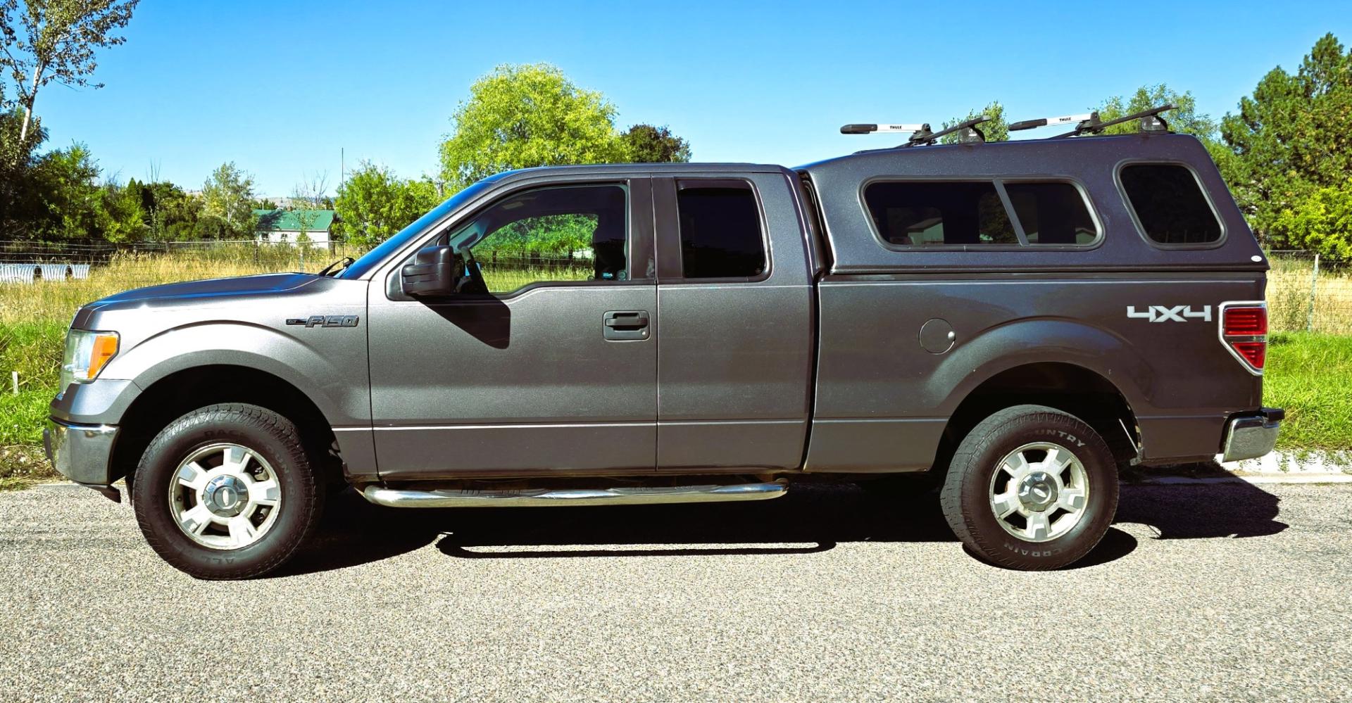 2012 Grey /Gray Ford F-150 XLT SuperCab 6.5-ft. Bed 4WD (1FTEX1EM3CF) with an 3.7L V6 DOHC 24V engine, 6-Speed Automatic transmission, located at 450 N Russell, Missoula, MT, 59801, (406) 543-6600, 46.874496, -114.017433 - 4WD Ford F-150 Pickup with Nice Matching Topper. 3.7L V6 Engine. 6 Speed Automatic Transmission. New Tires! Air Conditioning. AM FM CD Player with Bluetooth Phone Connectivity. Cruise Control. Seats 6. Rear Sliding Window. We Finance through local Credit Unions. We do NOT offer In House (Buy Her- Photo#4