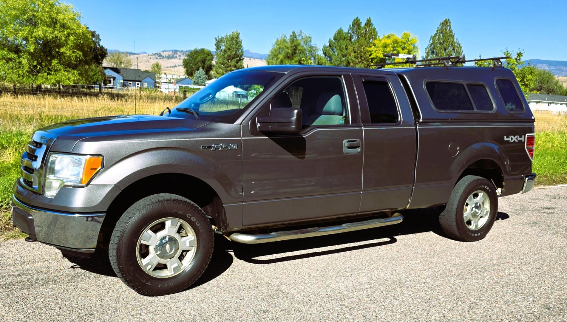 2012 Grey /Gray Ford F-150 XLT SuperCab 6.5-ft. Bed 4WD (1FTEX1EM3CF) with an 3.7L V6 DOHC 24V engine, 6-Speed Automatic transmission, located at 450 N Russell, Missoula, MT, 59801, (406) 543-6600, 46.874496, -114.017433 - 4WD Ford F-150 Pickup with Nice Matching Topper. 3.7L V6 Engine. 6 Speed Automatic Transmission. New Tires! Air Conditioning. AM FM CD Player with Bluetooth Phone Connectivity. Cruise Control. Seats 6. Rear Sliding Window. We Finance through local Credit Unions. We do NOT offer In House (Buy Her- Photo#5