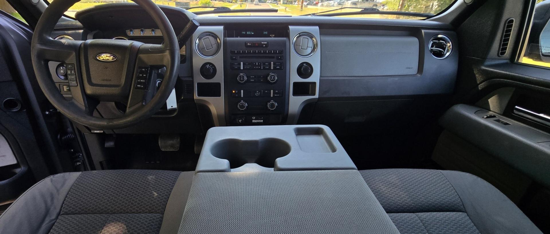 2012 Grey /Gray Ford F-150 XLT SuperCab 6.5-ft. Bed 4WD (1FTEX1EM3CF) with an 3.7L V6 DOHC 24V engine, 6-Speed Automatic transmission, located at 450 N Russell, Missoula, MT, 59801, (406) 543-6600, 46.874496, -114.017433 - 4WD Ford F-150 Pickup with Nice Matching Topper. 3.7L V6 Engine. 6 Speed Automatic Transmission. New Tires! Air Conditioning. AM FM CD Player with Bluetooth Phone Connectivity. Cruise Control. Seats 6. Rear Sliding Window. We Finance through local Credit Unions. We do NOT offer In House (Buy Her- Photo#11