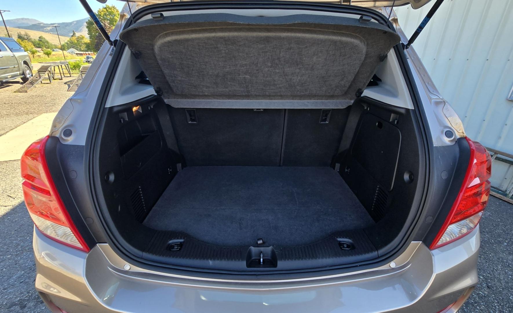2018 Brown /Black Chevrolet Trax LS AWD (3GNCJNSBXJL) with an 1.4L L4 DOHC 16V engine, 6A transmission, located at 450 N Russell, Missoula, MT, 59801, (406) 543-6600, 46.874496, -114.017433 - Clean AWD Low Mile SUV that with get you around in the Winter and save money on Fuel. Economical 1.4L I4 Eco Tec Engine. 6 Speed Automatic Transmission. Air Conditioning. Cruise Control. Power Windows and Locks. Touch Screen Stereo with Bluetooth Audio and Phone Connectivity. Backup Camera. Tires ar- Photo#13