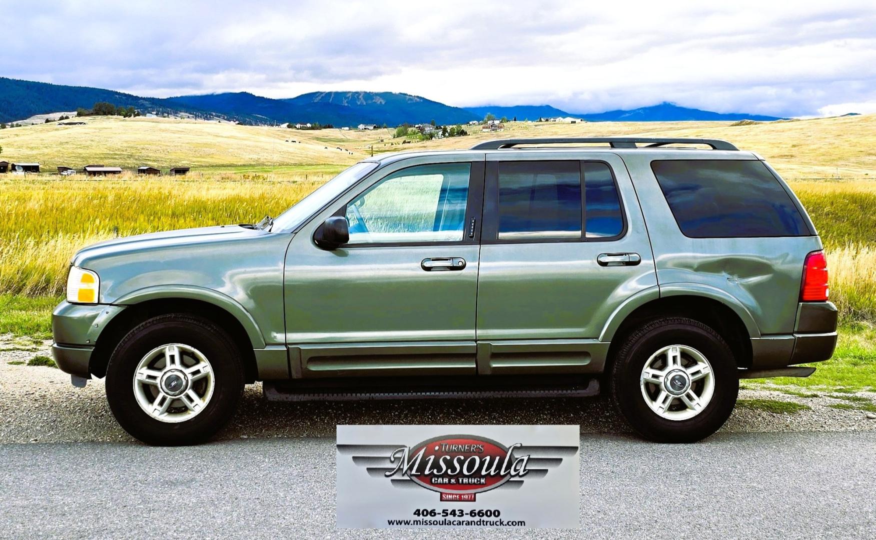 2002 Green /Gray Ford Explorer Eddie Bauer 4WD (1FMDU74E72Z) with an 4.0L V6 SOHC 16V engine, 5A OD transmission, located at 450 N Russell, Missoula, MT, 59801, (406) 543-6600, 46.874496, -114.017433 - Great Running inexpensive 4WD SUV with 3rd Row Seats. Does have a salvage title. 4.0L V6 Engine runs great. 4WD works good. Air Conditioning blows cold. Power Windows and Locks all work. Heated Power Front Seats. Front and Rear Air. Good Tires. Running Boards. The drivers seat has a tear but the res- Photo#2