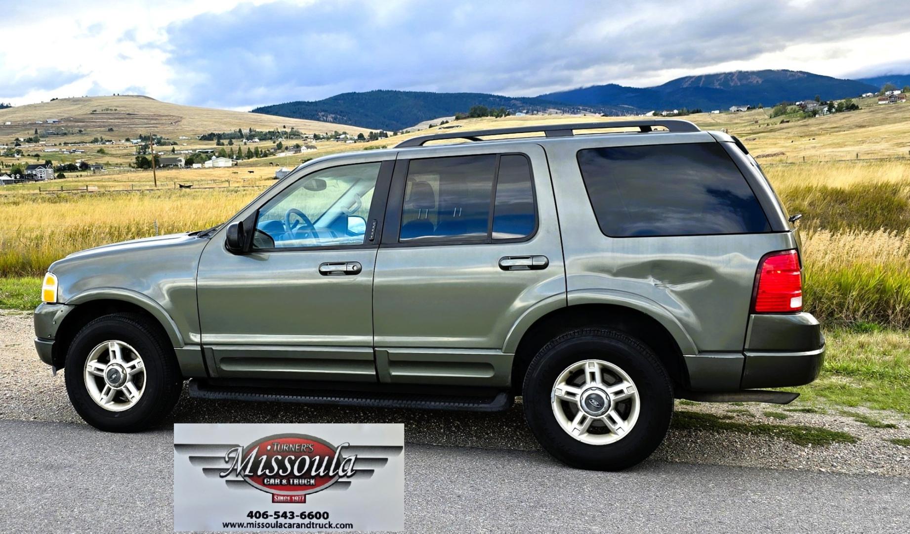 2002 Green /Gray Ford Explorer Eddie Bauer 4WD (1FMDU74E72Z) with an 4.0L V6 SOHC 16V engine, 5A OD transmission, located at 450 N Russell, Missoula, MT, 59801, (406) 543-6600, 46.874496, -114.017433 - Great Running inexpensive 4WD SUV with 3rd Row Seats. Does have a salvage title. 4.0L V6 Engine runs great. 4WD works good. Air Conditioning blows cold. Power Windows and Locks all work. Heated Power Front Seats. Front and Rear Air. Good Tires. Running Boards. The drivers seat has a tear but the res- Photo#1