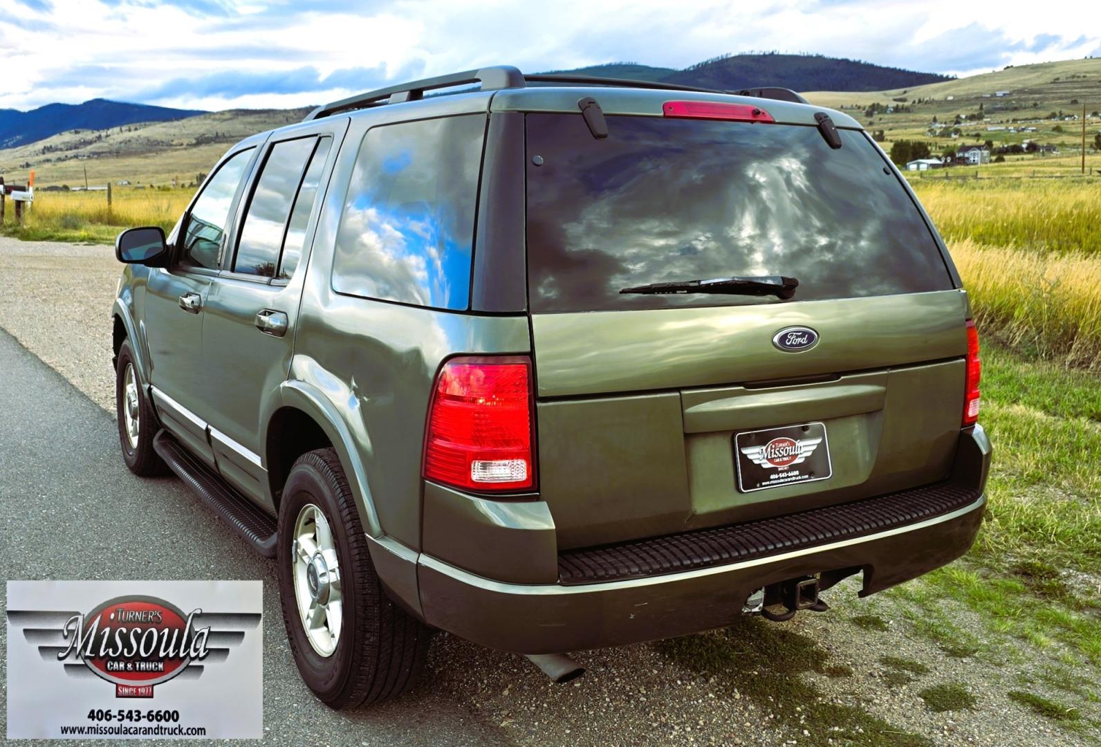 2002 Green /Gray Ford Explorer Eddie Bauer 4WD (1FMDU74E72Z) with an 4.0L V6 SOHC 16V engine, 5A OD transmission, located at 450 N Russell, Missoula, MT, 59801, (406) 543-6600, 46.874496, -114.017433 - Great Running inexpensive 4WD SUV with 3rd Row Seats. Does have a salvage title. 4.0L V6 Engine runs great. 4WD works good. Air Conditioning blows cold. Power Windows and Locks all work. Heated Power Front Seats. Front and Rear Air. Good Tires. Running Boards. The drivers seat has a tear but the res- Photo#5