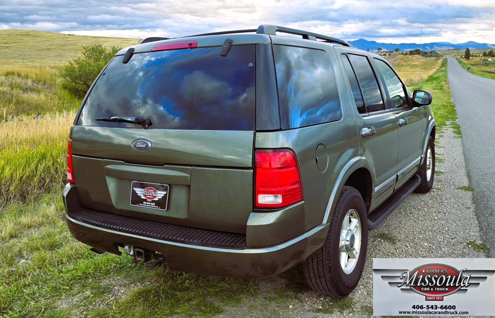 2002 Green /Gray Ford Explorer Eddie Bauer 4WD (1FMDU74E72Z) with an 4.0L V6 SOHC 16V engine, 5A OD transmission, located at 450 N Russell, Missoula, MT, 59801, (406) 543-6600, 46.874496, -114.017433 - Great Running inexpensive 4WD SUV with 3rd Row Seats. Does have a salvage title. 4.0L V6 Engine runs great. 4WD works good. Air Conditioning blows cold. Power Windows and Locks all work. Heated Power Front Seats. Front and Rear Air. Good Tires. Running Boards. The drivers seat has a tear but the res- Photo#8