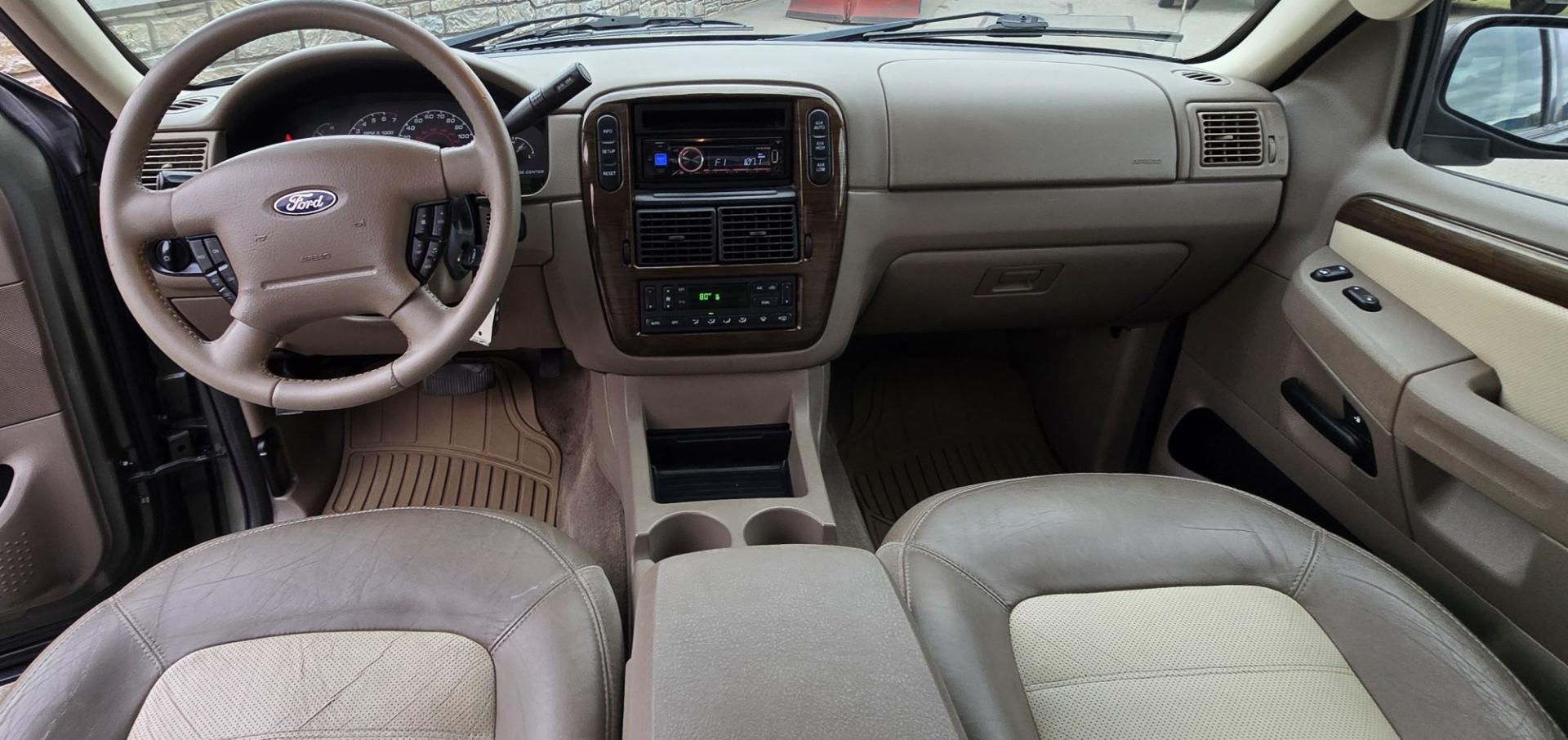 2002 Green /Gray Ford Explorer Eddie Bauer 4WD (1FMDU74E72Z) with an 4.0L V6 SOHC 16V engine, 5A OD transmission, located at 450 N Russell, Missoula, MT, 59801, (406) 543-6600, 46.874496, -114.017433 - Great Running inexpensive 4WD SUV with 3rd Row Seats. Does have a salvage title. 4.0L V6 Engine runs great. 4WD works good. Air Conditioning blows cold. Power Windows and Locks all work. Heated Power Front Seats. Front and Rear Air. Good Tires. Running Boards. The drivers seat has a tear but the res- Photo#20