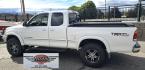 2000 White /Tan Toyota Tundra Limited Access Cab 4WD (5TBBT4811YS) with an 4.7L V8 DOHC 32V engine, 4A OD transmission, located at 450 N Russell, Missoula, MT, 59801, (406) 543-6600, 46.874496, -114.017433 - Treated like it was a member of the family. Immaculately Maintained. Near Bulletproof 4.7L V8 Engine. Automatic Transmission. Four Wheel Drive. Timing Belt was changes at 81K Miles. Air Conditioning. Cruise Control. Brush Guard with Good Flog Lights. Power Windows and Locks. Remote Engine Start. Nic- Photo#7
