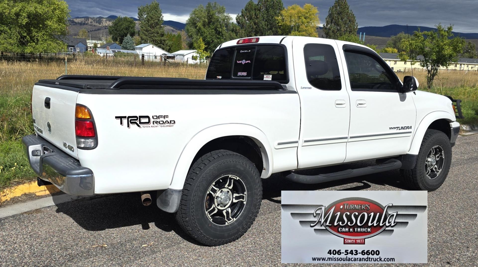 2000 White /Tan Toyota Tundra Limited Access Cab 4WD (5TBBT4811YS) with an 4.7L V8 DOHC 32V engine, 4A OD transmission, located at 450 N Russell, Missoula, MT, 59801, (406) 543-6600, 46.874496, -114.017433 - Treated like it was a member of the family. Immaculately Maintained. Near Bulletproof 4.7L V8 Engine. Automatic Transmission. Four Wheel Drive. Timing Belt was changes at 81K Miles. Air Conditioning. Cruise Control. Brush Guard with Good Flog Lights. Power Windows and Locks. Remote Engine Start. Nic- Photo#1