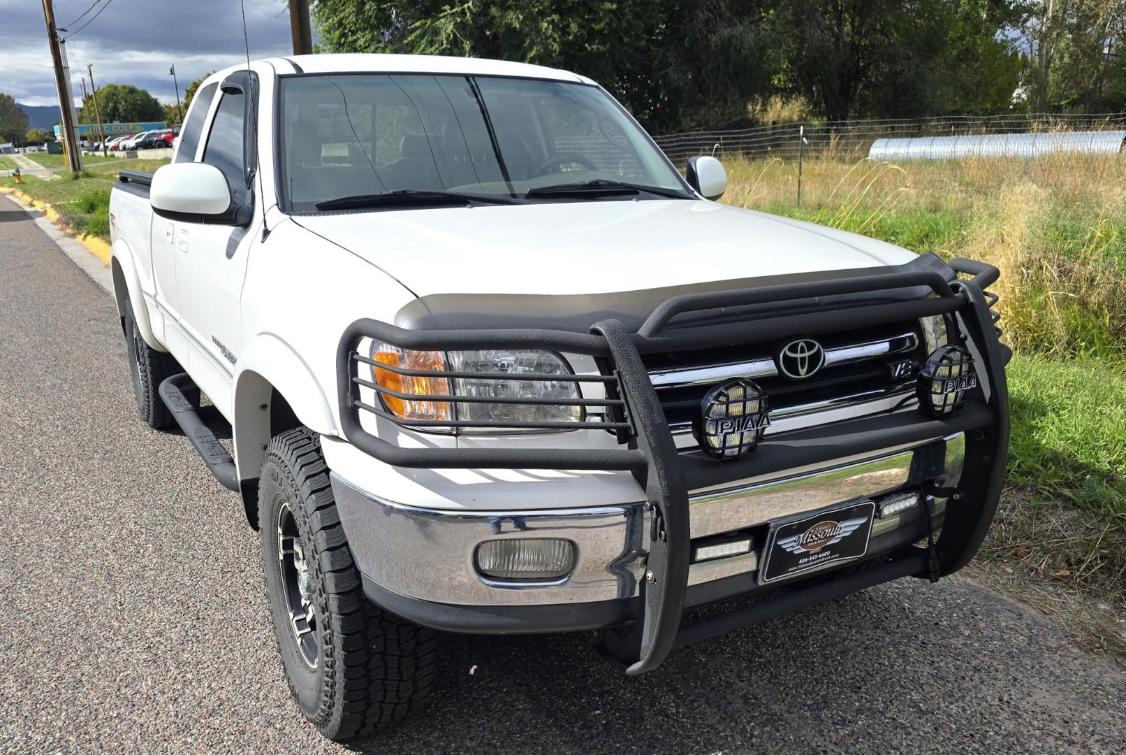 2000 White /Tan Toyota Tundra Limited Access Cab 4WD (5TBBT4811YS) with an 4.7L V8 DOHC 32V engine, 4A OD transmission, located at 450 N Russell, Missoula, MT, 59801, (406) 543-6600, 46.874496, -114.017433 - Treated like it was a member of the family. Immaculately Maintained. Near Bulletproof 4.7L V8 Engine. Automatic Transmission. Four Wheel Drive. Timing Belt was changes at 81K Miles. Air Conditioning. Cruise Control. Brush Guard with Good Flog Lights. Power Windows and Locks. Remote Engine Start. Nic- Photo#6