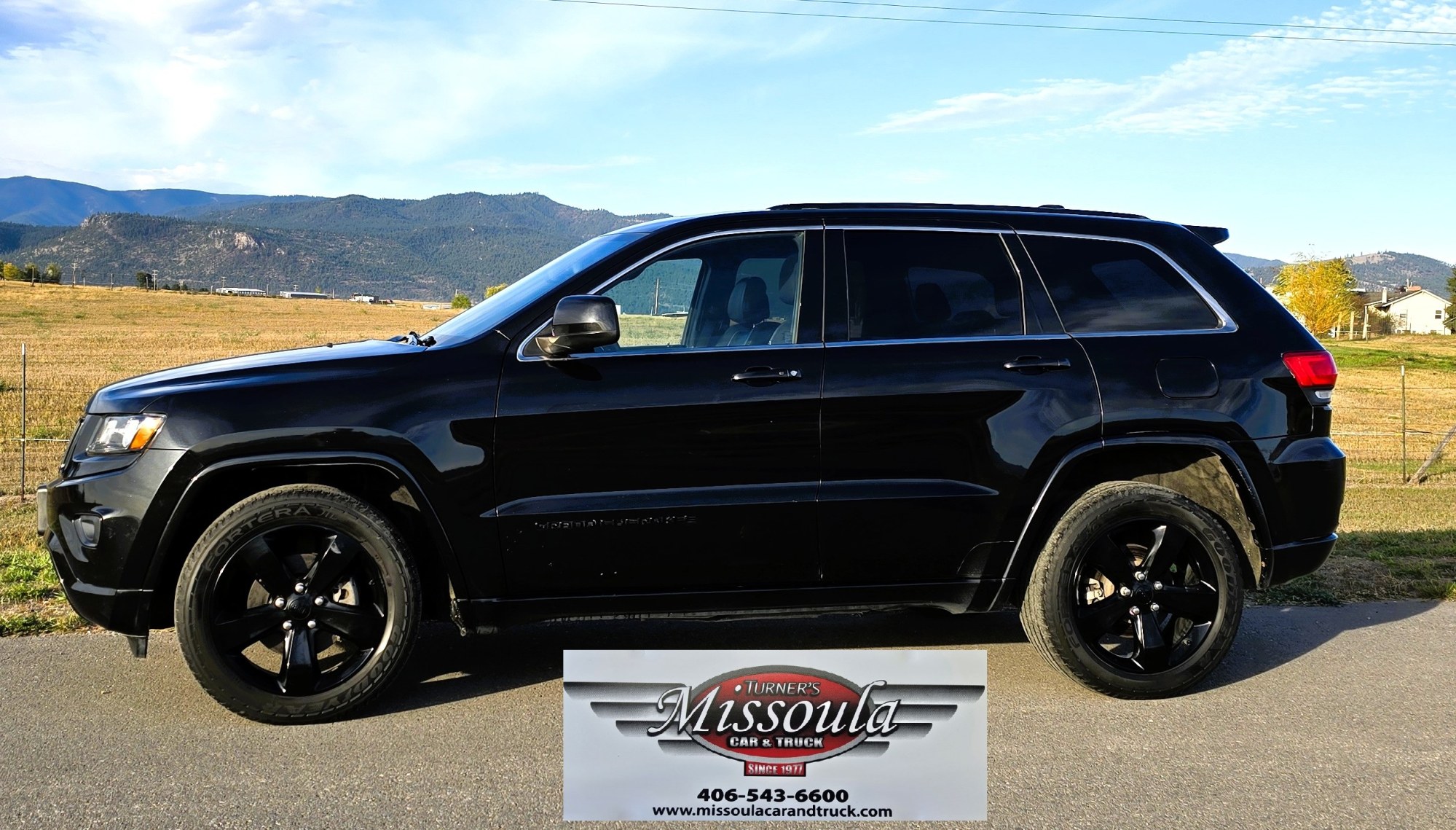 photo of 2015 Jeep Grand Cherokee Altitude 4WD only 86K Miles!
