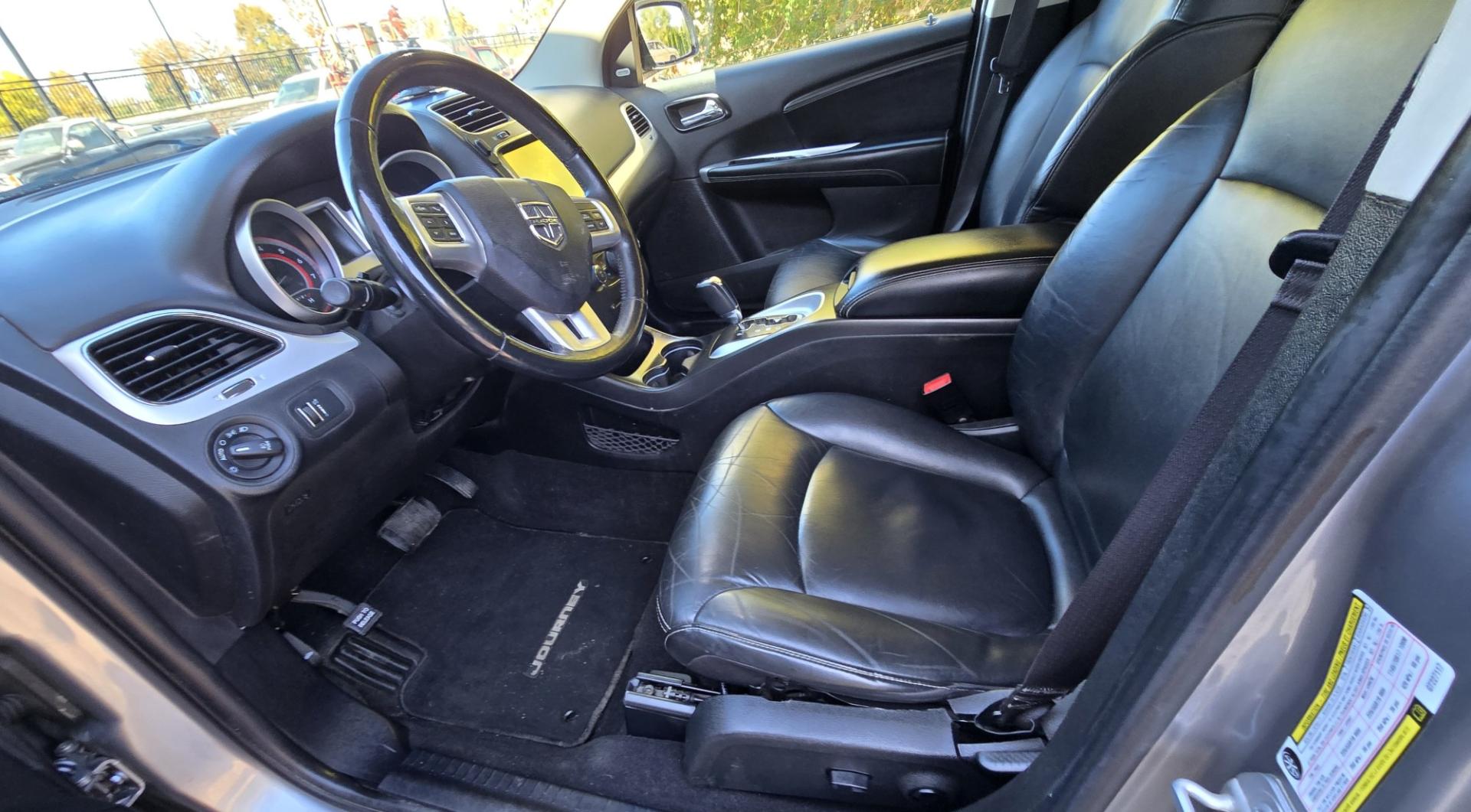 2016 Silver /Black Dodge Journey R/T AWD (3C4PDDFG9GT) with an 3.6L V6 DOHC 24V engine, 6A transmission, located at 450 N Russell, Missoula, MT, 59801, (406) 543-6600, 46.874496, -114.017433 - Reliable AWD SUV with 3rd Row Seating. Great Family Car at an Affordable Price. 3.6L V6 Engine. 6 Speed Automatic Transmission. NEW Tires Front and Rear Air Conditioning Touch Screen AM FM Sat CD Player with Bluetooth Cruise Control Tilt Steering Heated Seats and Steering Wheel We Fina- Photo#9
