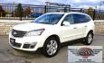 2015 White /Gray Chevrolet Traverse LTZ AWD (1GNKVJKD3FJ) with an 3.6L V6 DOHC 24V engine, 6 Speed Automatic transmission, located at 450 N Russell, Missoula, MT, 59801, (406) 543-6600, 46.874496, -114.017433 - There is a lot of car for the money here. 2015 AWD Chevy Traverse. 3.6L V6 Engine. 6 Speed Automatic Transmission. 3rd Row Seating. Navigation. Backup Camera. Heated and Cooled Front Seats. Two Sunroofs. Front and Rear Climate Control. AM FM CD Player with Touch Screen. Bluetooth Audio and Phone. Cl- Photo#0