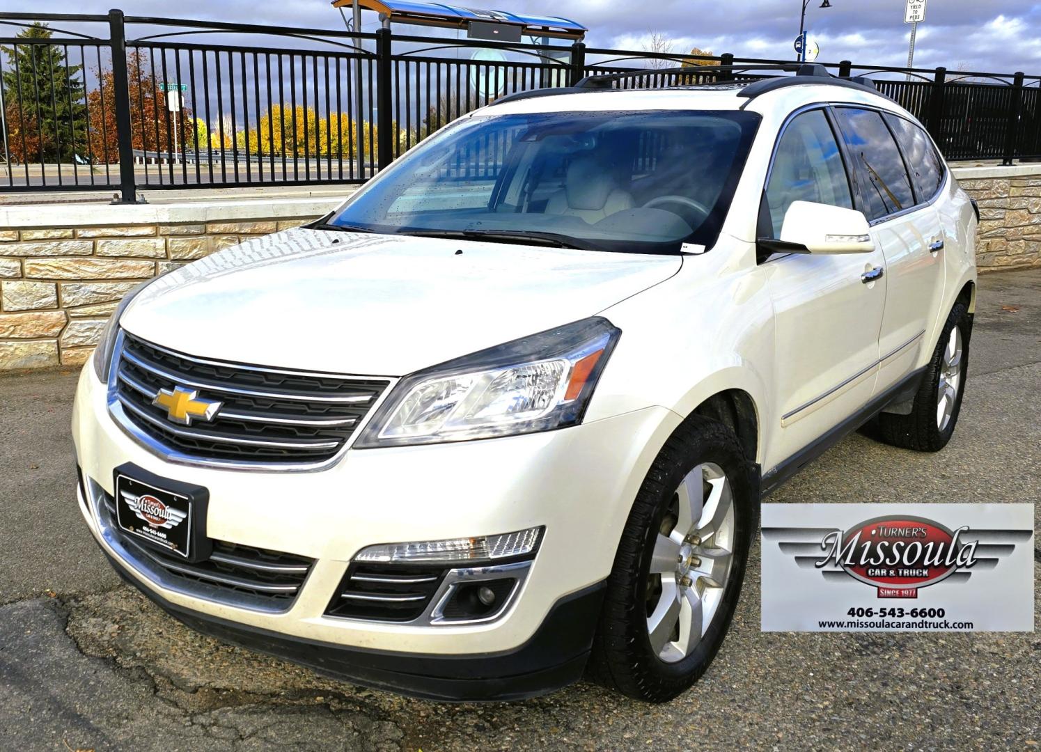 2015 White /Gray Chevrolet Traverse LTZ AWD (1GNKVJKD3FJ) with an 3.6L V6 DOHC 24V engine, 6 Speed Automatic transmission, located at 450 N Russell, Missoula, MT, 59801, (406) 543-6600, 46.874496, -114.017433 - There is a lot of car for the money here. 2015 AWD Chevy Traverse. 3.6L V6 Engine. 6 Speed Automatic Transmission. 3rd Row Seating. Navigation. Backup Camera. Heated and Cooled Front Seats. Two Sunroofs. Front and Rear Climate Control. AM FM CD Player with Touch Screen. Bluetooth Audio and Phone. Cl- Photo#4