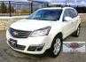 2015 White /Gray Chevrolet Traverse LTZ AWD (1GNKVJKD3FJ) with an 3.6L V6 DOHC 24V engine, 6 Speed Automatic transmission, located at 450 N Russell, Missoula, MT, 59801, (406) 543-6600, 46.874496, -114.017433 - There is a lot of car for the money here. 2015 AWD Chevy Traverse. 3.6L V6 Engine. 6 Speed Automatic Transmission. 3rd Row Seating. Navigation. Backup Camera. Heated and Cooled Front Seats. Two Sunroofs. Front and Rear Climate Control. AM FM CD Player with Touch Screen. Bluetooth Audio and Phone. Cl- Photo#4