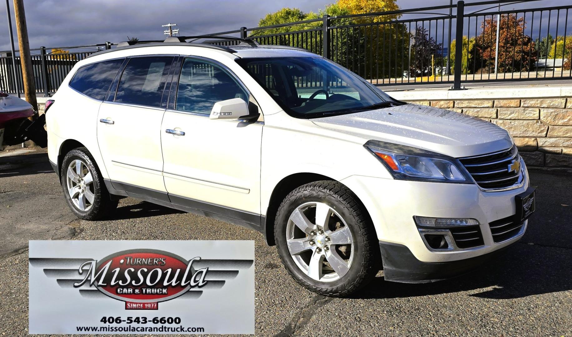 2015 White /Gray Chevrolet Traverse LTZ AWD (1GNKVJKD3FJ) with an 3.6L V6 DOHC 24V engine, 6 Speed Automatic transmission, located at 450 N Russell, Missoula, MT, 59801, (406) 543-6600, 46.874496, -114.017433 - There is a lot of car for the money here. 2015 AWD Chevy Traverse. 3.6L V6 Engine. 6 Speed Automatic Transmission. 3rd Row Seating. Navigation. Backup Camera. Heated and Cooled Front Seats. Two Sunroofs. Front and Rear Climate Control. AM FM CD Player with Touch Screen. Bluetooth Audio and Phone. Cl- Photo#5