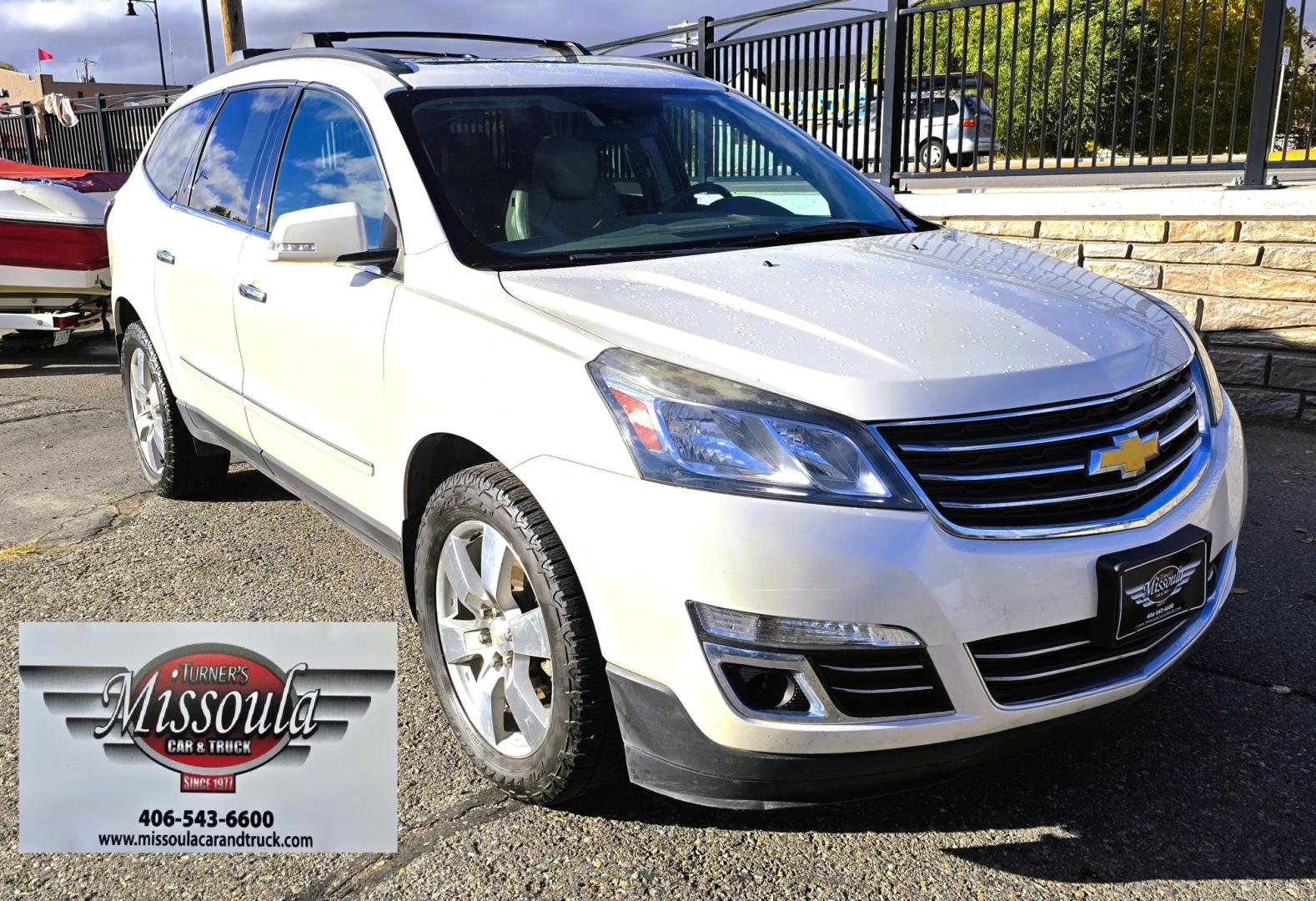 2015 White /Gray Chevrolet Traverse LTZ AWD (1GNKVJKD3FJ) with an 3.6L V6 DOHC 24V engine, 6 Speed Automatic transmission, located at 450 N Russell, Missoula, MT, 59801, (406) 543-6600, 46.874496, -114.017433 - There is a lot of car for the money here. 2015 AWD Chevy Traverse. 3.6L V6 Engine. 6 Speed Automatic Transmission. 3rd Row Seating. Navigation. Backup Camera. Heated and Cooled Front Seats. Two Sunroofs. Front and Rear Climate Control. AM FM CD Player with Touch Screen. Bluetooth Audio and Phone. Cl- Photo#6