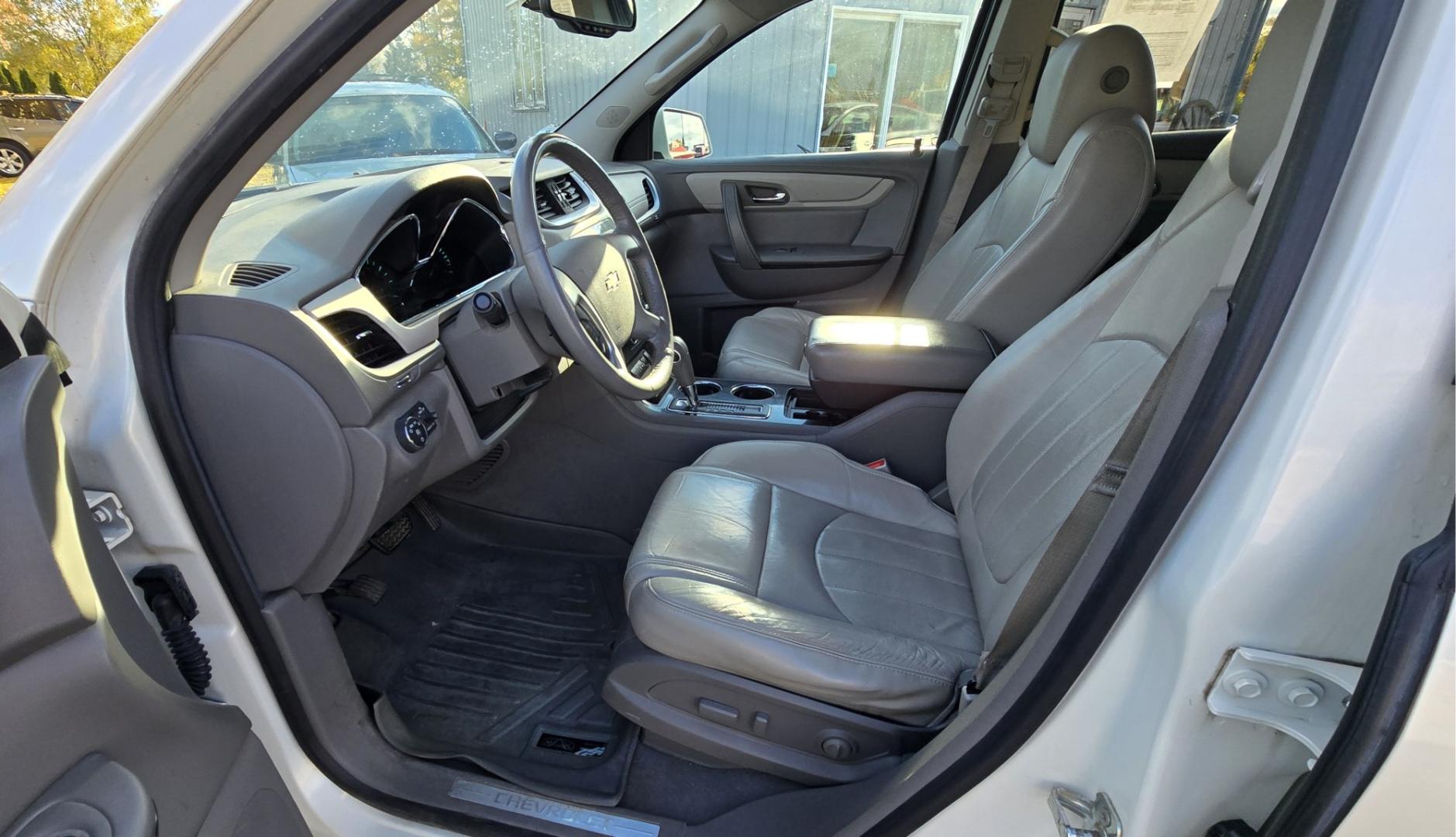 2015 White /Gray Chevrolet Traverse LTZ AWD (1GNKVJKD3FJ) with an 3.6L V6 DOHC 24V engine, 6 Speed Automatic transmission, located at 450 N Russell, Missoula, MT, 59801, (406) 543-6600, 46.874496, -114.017433 - There is a lot of car for the money here. 2015 AWD Chevy Traverse. 3.6L V6 Engine. 6 Speed Automatic Transmission. 3rd Row Seating. Navigation. Backup Camera. Heated and Cooled Front Seats. Two Sunroofs. Front and Rear Climate Control. AM FM CD Player with Touch Screen. Bluetooth Audio and Phone. Cl- Photo#12