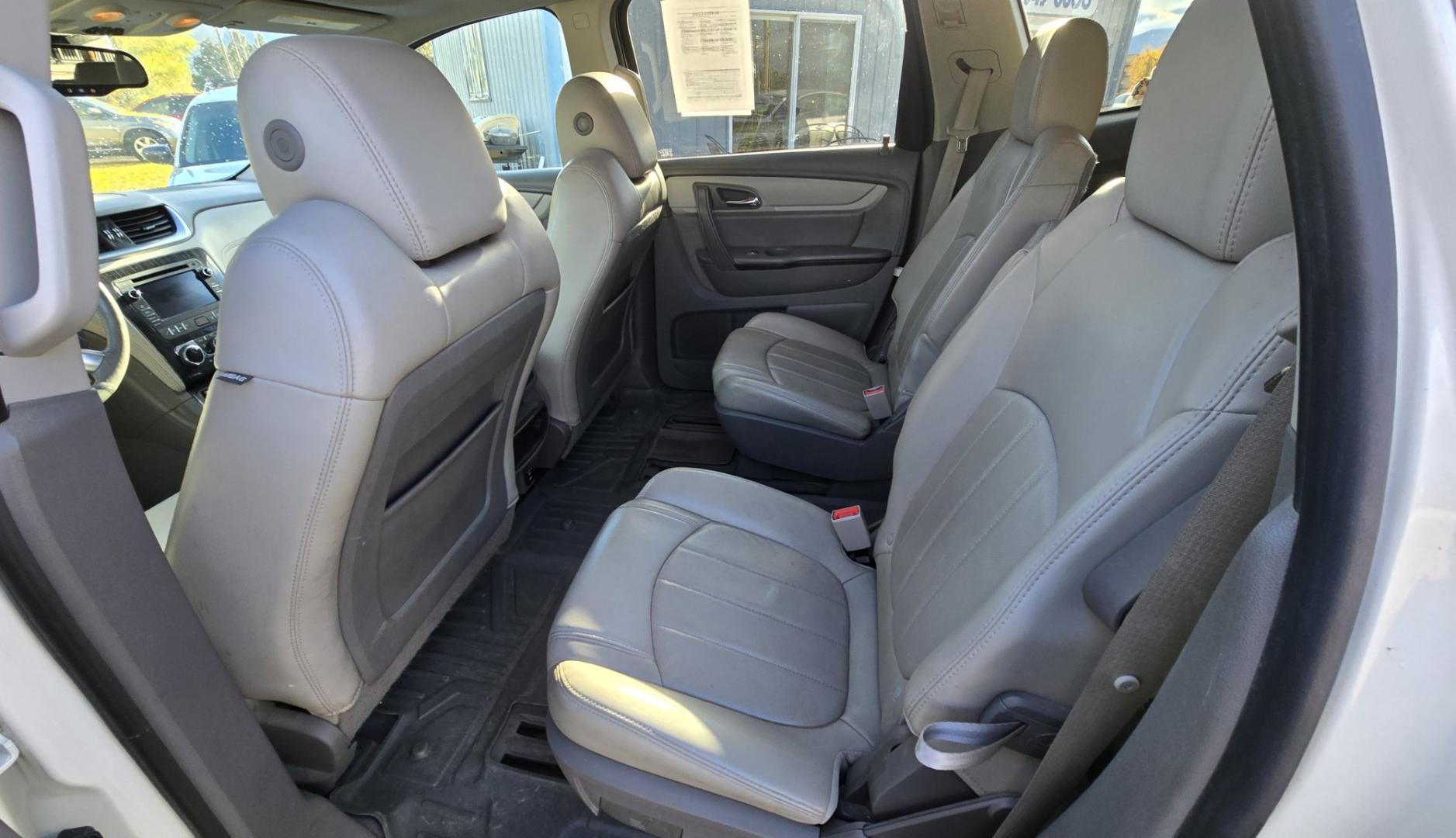 2015 White /Gray Chevrolet Traverse LTZ AWD (1GNKVJKD3FJ) with an 3.6L V6 DOHC 24V engine, 6 Speed Automatic transmission, located at 450 N Russell, Missoula, MT, 59801, (406) 543-6600, 46.874496, -114.017433 - There is a lot of car for the money here. 2015 AWD Chevy Traverse. 3.6L V6 Engine. 6 Speed Automatic Transmission. 3rd Row Seating. Navigation. Backup Camera. Heated and Cooled Front Seats. Two Sunroofs. Front and Rear Climate Control. AM FM CD Player with Touch Screen. Bluetooth Audio and Phone. Cl- Photo#13