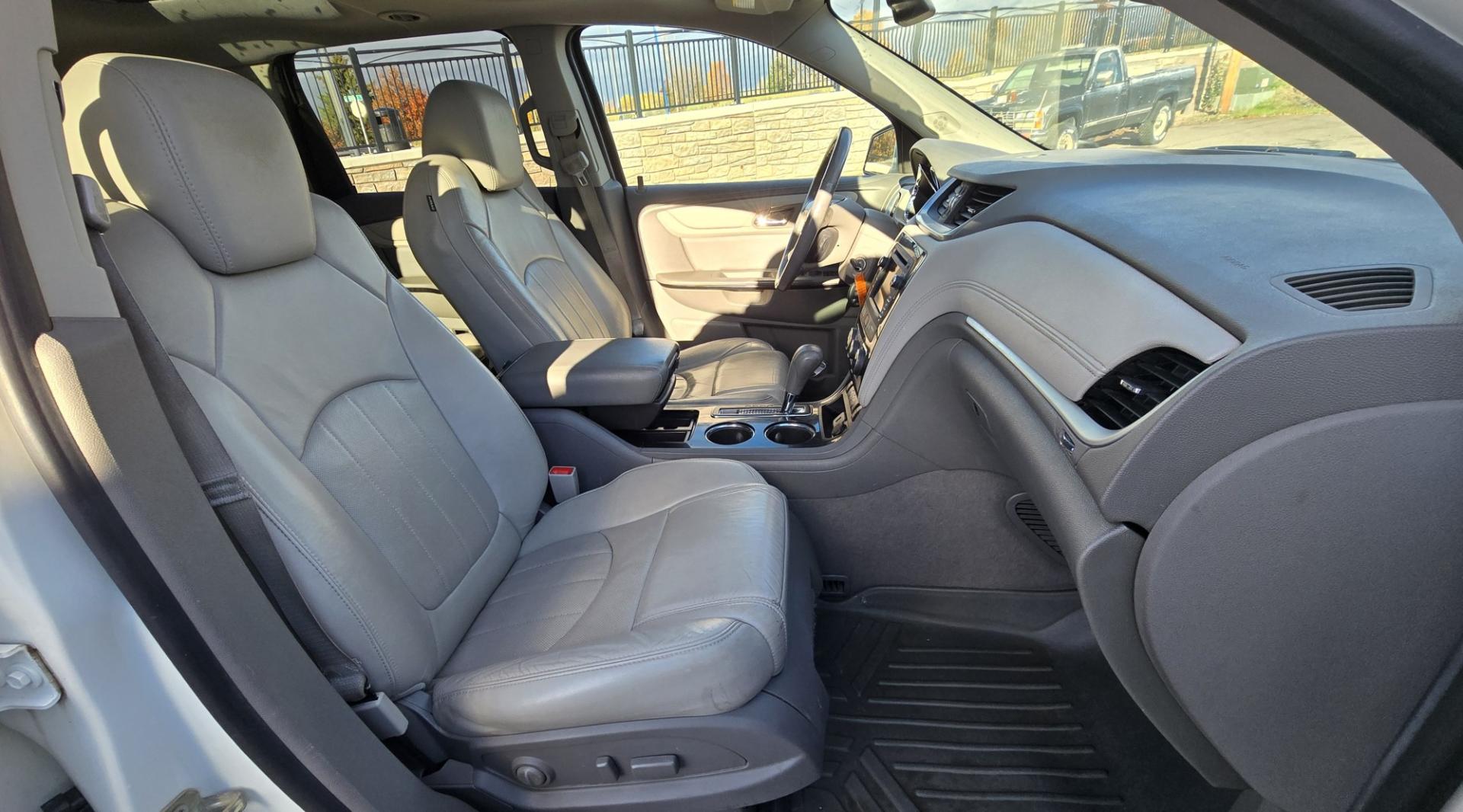 2015 White /Gray Chevrolet Traverse LTZ AWD (1GNKVJKD3FJ) with an 3.6L V6 DOHC 24V engine, 6 Speed Automatic transmission, located at 450 N Russell, Missoula, MT, 59801, (406) 543-6600, 46.874496, -114.017433 - There is a lot of car for the money here. 2015 AWD Chevy Traverse. 3.6L V6 Engine. 6 Speed Automatic Transmission. 3rd Row Seating. Navigation. Backup Camera. Heated and Cooled Front Seats. Two Sunroofs. Front and Rear Climate Control. AM FM CD Player with Touch Screen. Bluetooth Audio and Phone. Cl- Photo#16