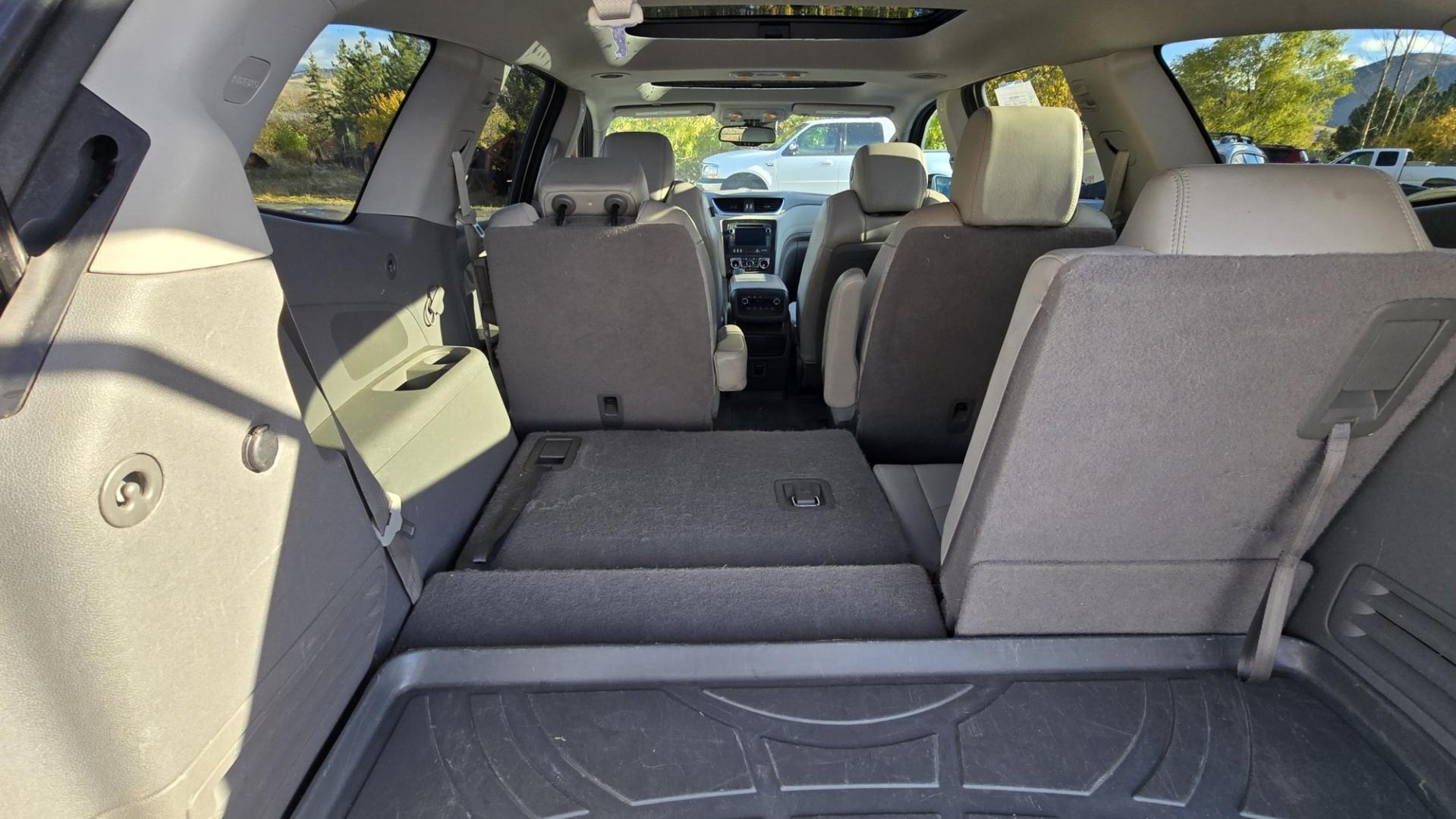 2015 White /Gray Chevrolet Traverse LTZ AWD (1GNKVJKD3FJ) with an 3.6L V6 DOHC 24V engine, 6 Speed Automatic transmission, located at 450 N Russell, Missoula, MT, 59801, (406) 543-6600, 46.874496, -114.017433 - There is a lot of car for the money here. 2015 AWD Chevy Traverse. 3.6L V6 Engine. 6 Speed Automatic Transmission. 3rd Row Seating. Navigation. Backup Camera. Heated and Cooled Front Seats. Two Sunroofs. Front and Rear Climate Control. AM FM CD Player with Touch Screen. Bluetooth Audio and Phone. Cl- Photo#18