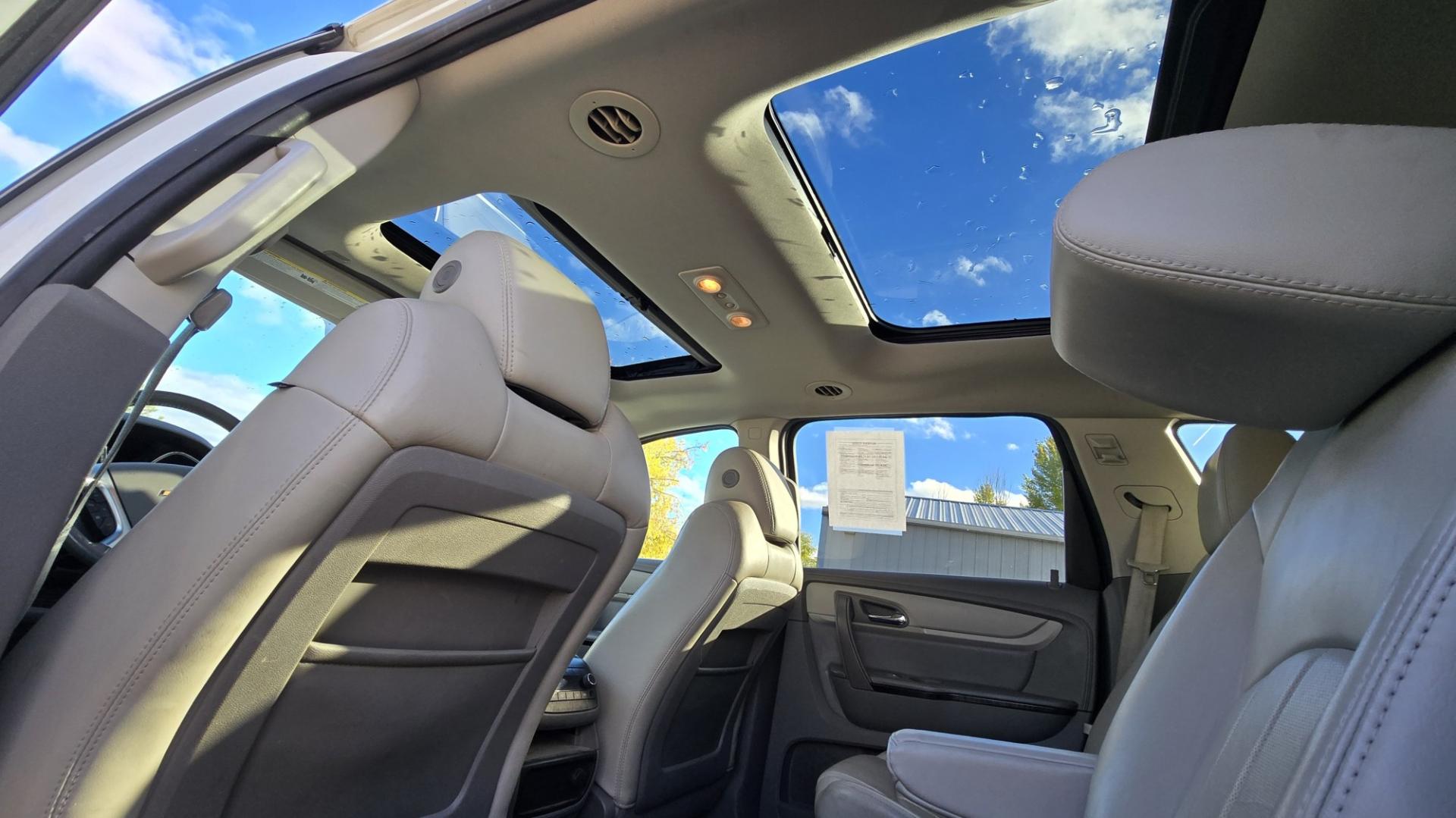 2015 White /Gray Chevrolet Traverse LTZ AWD (1GNKVJKD3FJ) with an 3.6L V6 DOHC 24V engine, 6 Speed Automatic transmission, located at 450 N Russell, Missoula, MT, 59801, (406) 543-6600, 46.874496, -114.017433 - There is a lot of car for the money here. 2015 AWD Chevy Traverse. 3.6L V6 Engine. 6 Speed Automatic Transmission. 3rd Row Seating. Navigation. Backup Camera. Heated and Cooled Front Seats. Two Sunroofs. Front and Rear Climate Control. AM FM CD Player with Touch Screen. Bluetooth Audio and Phone. Cl- Photo#20