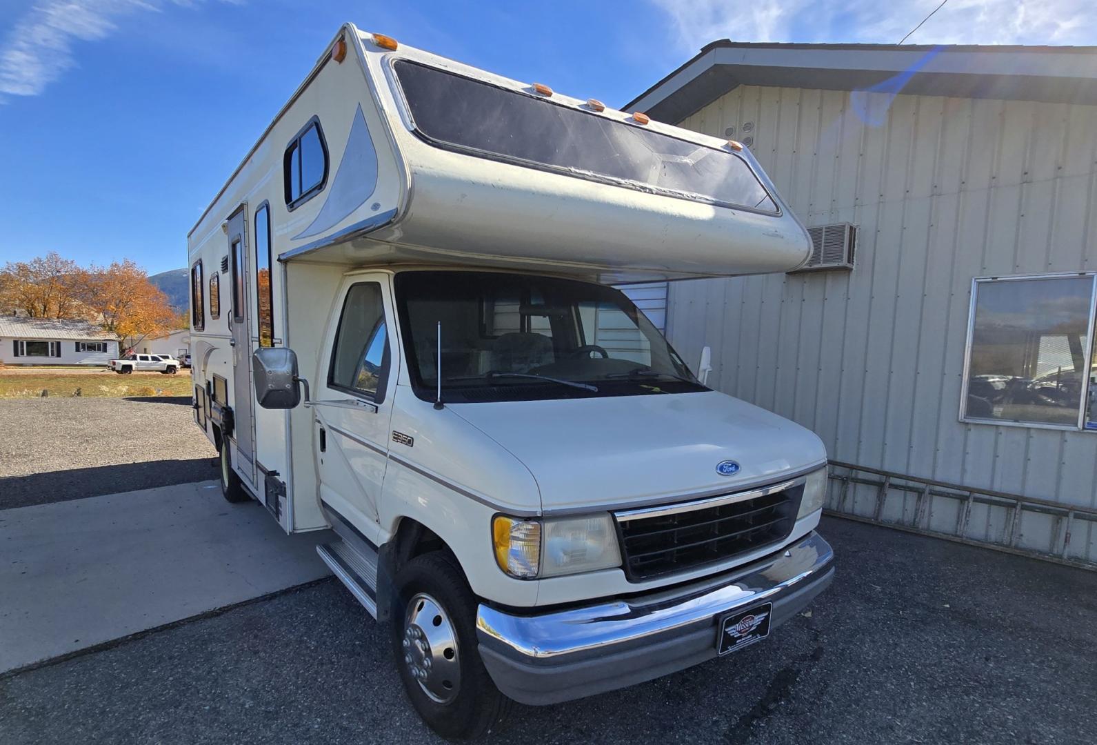 1993 White /Brown Ford Econoline E350 (1FDKE30GXPH) with an 7.5L V8 OHV 16V engine, Automatic transmission, located at 450 N Russell, Missoula, MT, 59801, (406) 543-6600, 46.874496, -114.017433 - Not Perfect but with these Miles, this Motor-home is a Steal! You read that right. Under 40K Miles. 7.5L V8 Engine. Like New Michelin Tires all around. RV was just winterized. Plumbing seems good. Electrical works on plug in. Fridge will run on electric or propane(hasn't been tested). Bed in front h- Photo#2