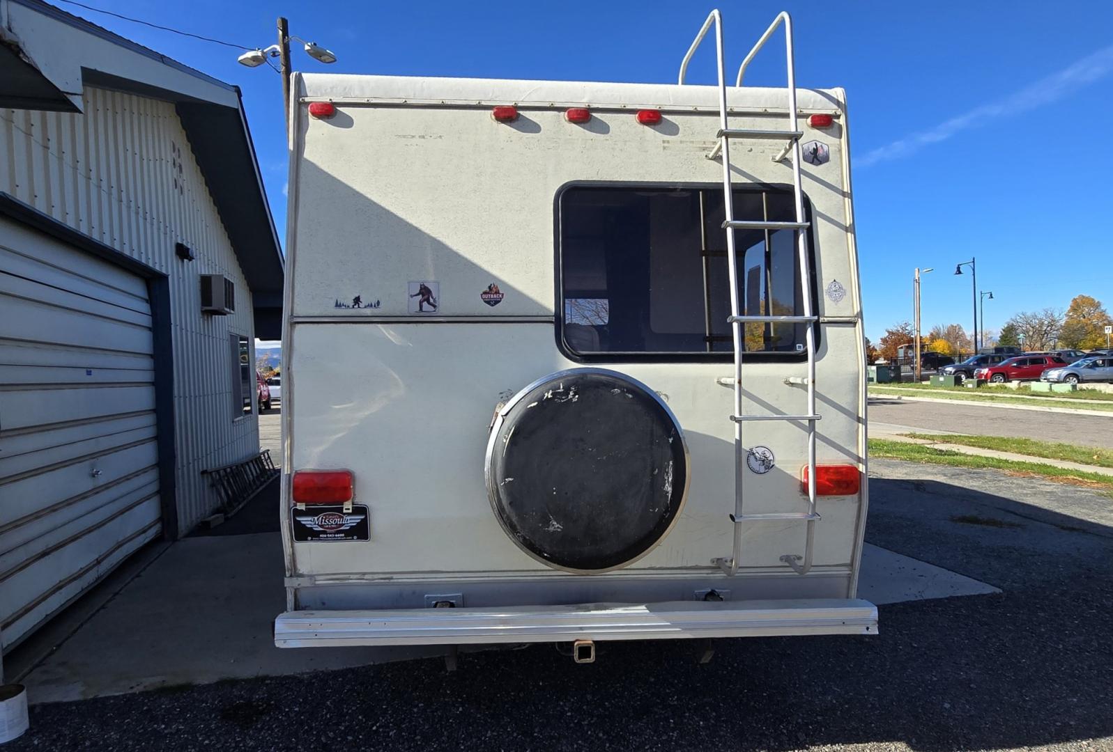 1993 White /Brown Ford Econoline E350 (1FDKE30GXPH) with an 7.5L V8 OHV 16V engine, Automatic transmission, located at 450 N Russell, Missoula, MT, 59801, (406) 543-6600, 46.874496, -114.017433 - Not Perfect but with these Miles, this Motor-home is a Steal! You read that right. Under 40K Miles. 7.5L V8 Engine. Like New Michelin Tires all around. RV was just winterized. Plumbing seems good. Electrical works on plug in. Fridge will run on electric or propane(hasn't been tested). Bed in front h- Photo#6