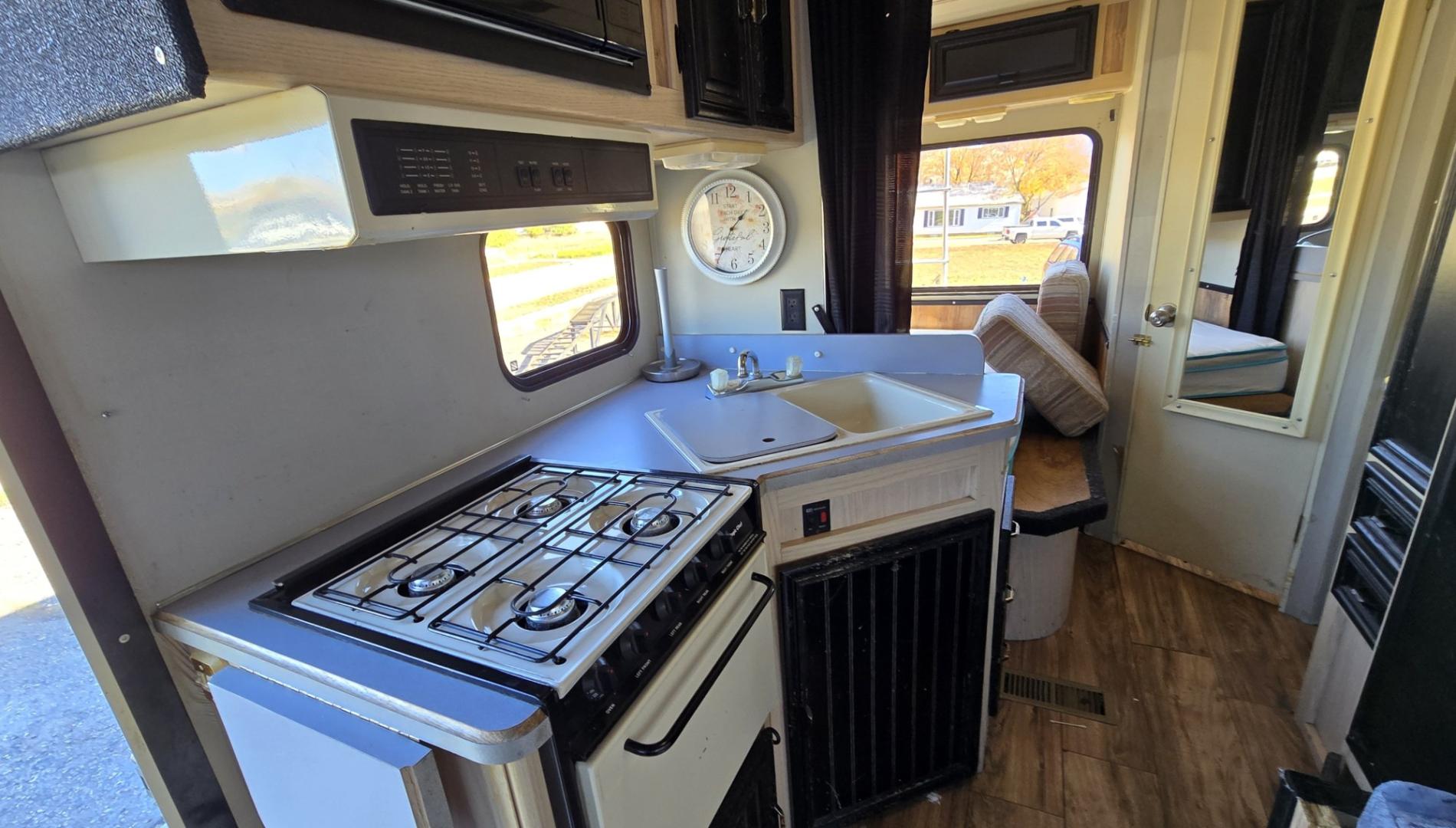1993 White /Brown Ford Econoline E350 (1FDKE30GXPH) with an 7.5L V8 OHV 16V engine, Automatic transmission, located at 450 N Russell, Missoula, MT, 59801, (406) 543-6600, 46.874496, -114.017433 - Not Perfect but with these Miles, this Motor-home is a Steal! You read that right. Under 40K Miles. 7.5L V8 Engine. Like New Michelin Tires all around. RV was just winterized. Plumbing seems good. Electrical works on plug in. Fridge will run on electric or propane(hasn't been tested). Bed in front h- Photo#18