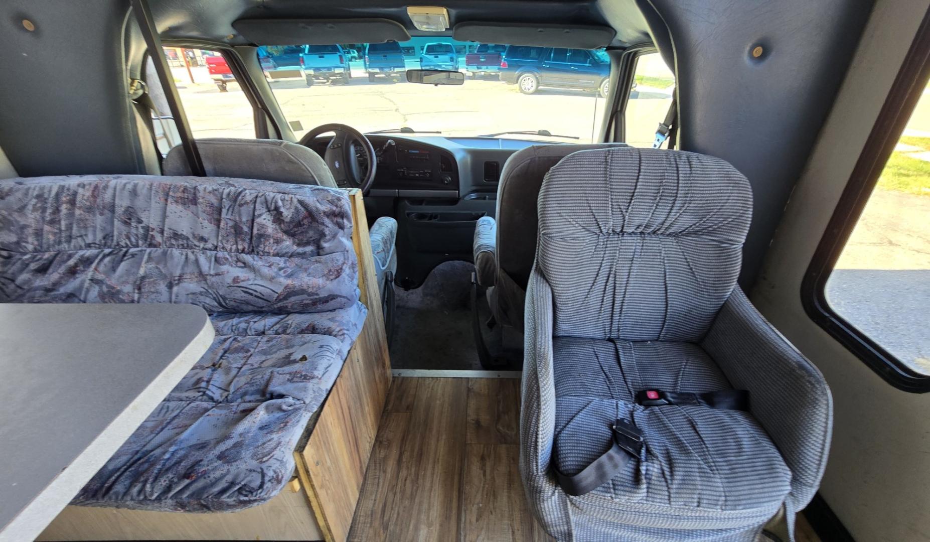 1993 White /Brown Ford Econoline E350 (1FDKE30GXPH) with an 7.5L V8 OHV 16V engine, Automatic transmission, located at 450 N Russell, Missoula, MT, 59801, (406) 543-6600, 46.874496, -114.017433 - Not Perfect but with these Miles, this Motor-home is a Steal! You read that right. Under 40K Miles. 7.5L V8 Engine. Like New Michelin Tires all around. RV was just winterized. Plumbing seems good. Electrical works on plug in. Fridge will run on electric or propane(hasn't been tested). Bed in front h- Photo#23