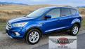 2017 Blue /Gray Ford Escape SE 4WD (1FMCU9GD9HU) with an 1.5L L4 DOHC 16V engine, 6A transmission, located at 450 N Russell, Missoula, MT, 59801, (406) 543-6600, 46.874496, -114.017433 - Cute little One Owner AWD SUV with Goodyear Tires all around. Ready for Winter Roads or Summer Cruising. Fuel Economy Friendly 1.4L I4 Engine. 6 Speed Automatic Transmission. Power Drivers Seat. Dual Climate Control. AM FM CD Player with Bluetooth Audio and Phone Connectivity. Backup Camera. Has a s- Photo#3