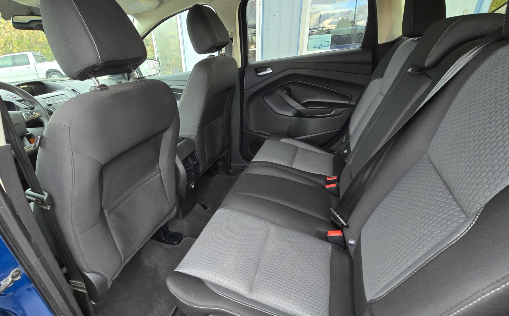 2017 Blue /Gray Ford Escape SE 4WD (1FMCU9GD9HU) with an 1.5L L4 DOHC 16V engine, 6A transmission, located at 450 N Russell, Missoula, MT, 59801, (406) 543-6600, 46.874496, -114.017433 - Cute little One Owner AWD SUV with Goodyear Tires all around. Ready for Winter Roads or Summer Cruising. Fuel Economy Friendly 1.4L I4 Engine. 6 Speed Automatic Transmission. Power Drivers Seat. Dual Climate Control. AM FM CD Player with Bluetooth Audio and Phone Connectivity. Backup Camera. Has a s- Photo#14