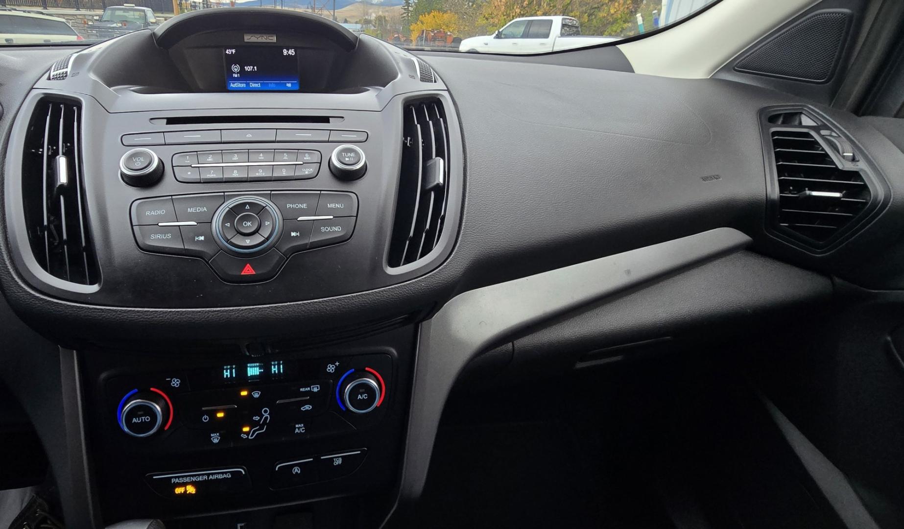 2017 Blue /Gray Ford Escape SE 4WD (1FMCU9GD9HU) with an 1.5L L4 DOHC 16V engine, 6A transmission, located at 450 N Russell, Missoula, MT, 59801, (406) 543-6600, 46.874496, -114.017433 - Cute little One Owner AWD SUV with Goodyear Tires all around. Ready for Winter Roads or Summer Cruising. Fuel Economy Friendly 1.4L I4 Engine. 6 Speed Automatic Transmission. Power Drivers Seat. Dual Climate Control. AM FM CD Player with Bluetooth Audio and Phone Connectivity. Backup Camera. Has a s- Photo#17
